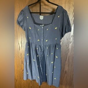 Navy dress with beautiful floral embroidery.